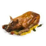 Cochinillo ibérico asado con patatas panaderas