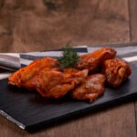 Alas adobadas Bandeja 450grs. aprox